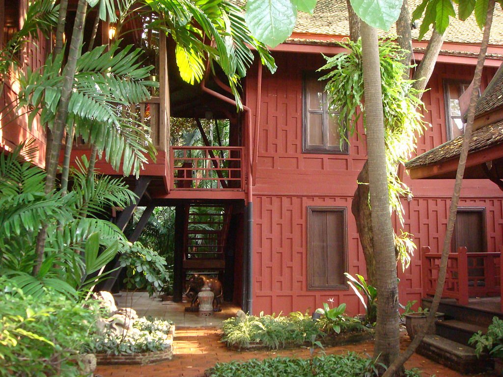 Exterior of the Jim Thompson House Museum built of wood in the traditional Thai style