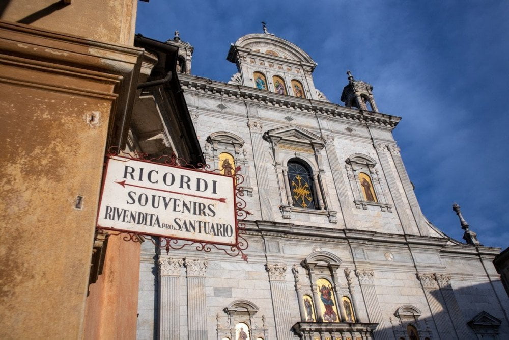 Basilica of the Sacro Monte of Varallo with souvenir shop sign