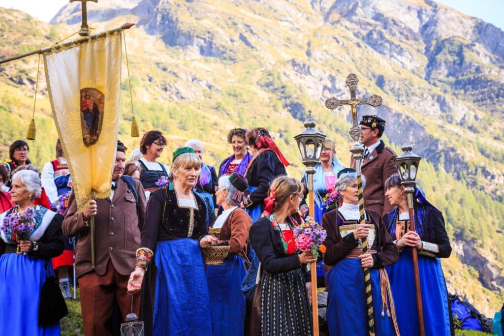 Walser people in traditional costumes in Alagna Valsesia