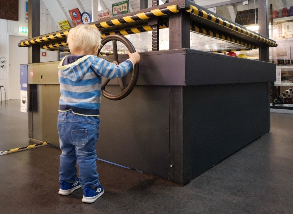 Ben Bertoni playing with an interactive exhibit at the Three Countries Museum in Lörrach, Germany