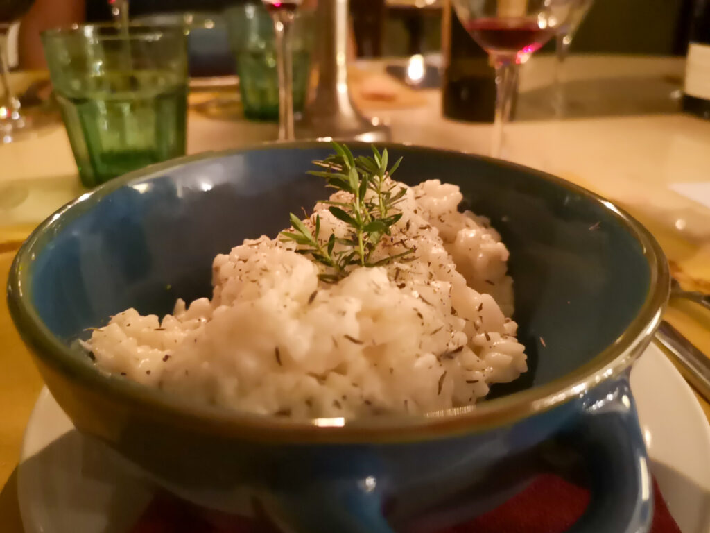 Rice with local toma cheese and thyme at the restaurant Casa del Pellegrino in Varallo Sesia