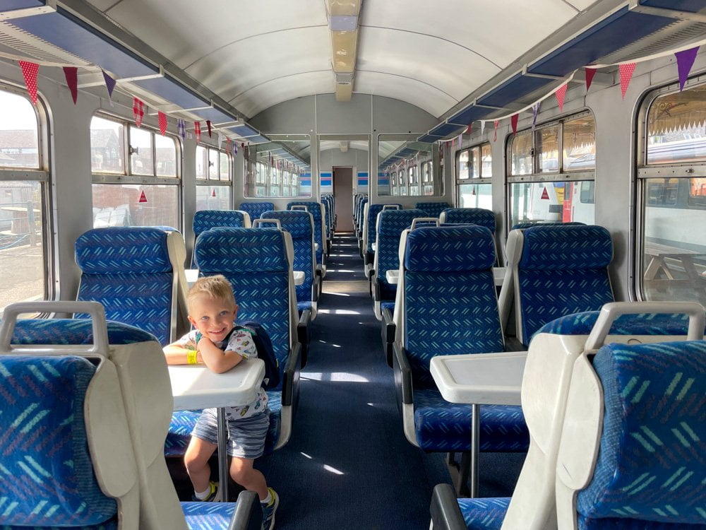 Paola Bertoni's son in one of the historic carriages of a Mid-Norfolk Railway train