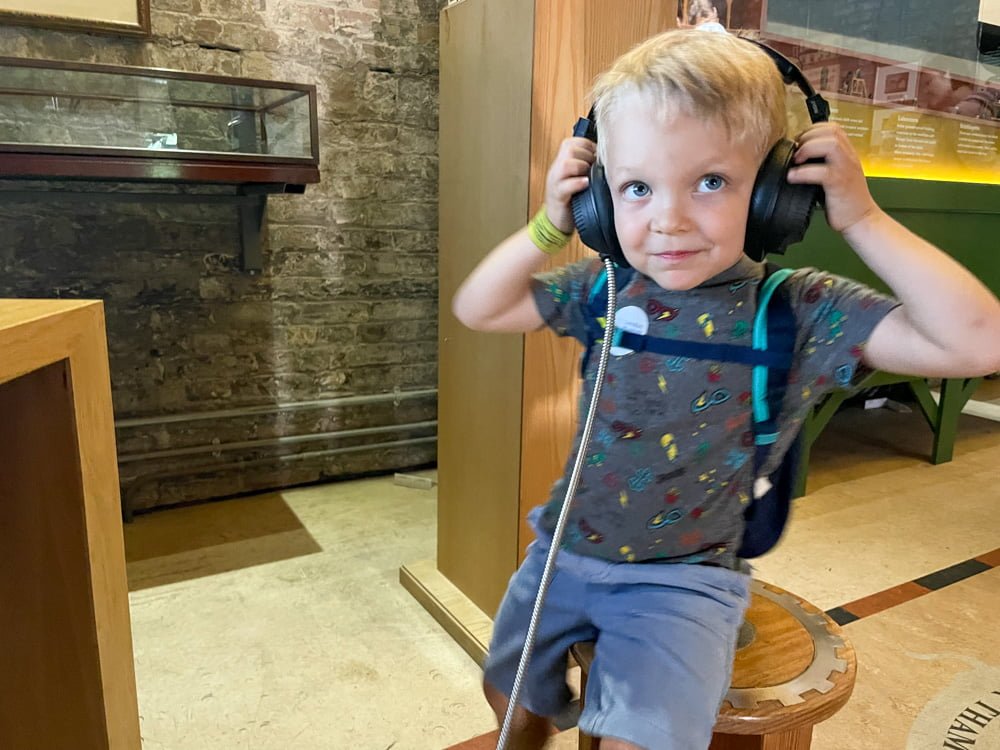 Ben Bertoni exploring the interactive Thames Tunnel display at the Brunel Museum
