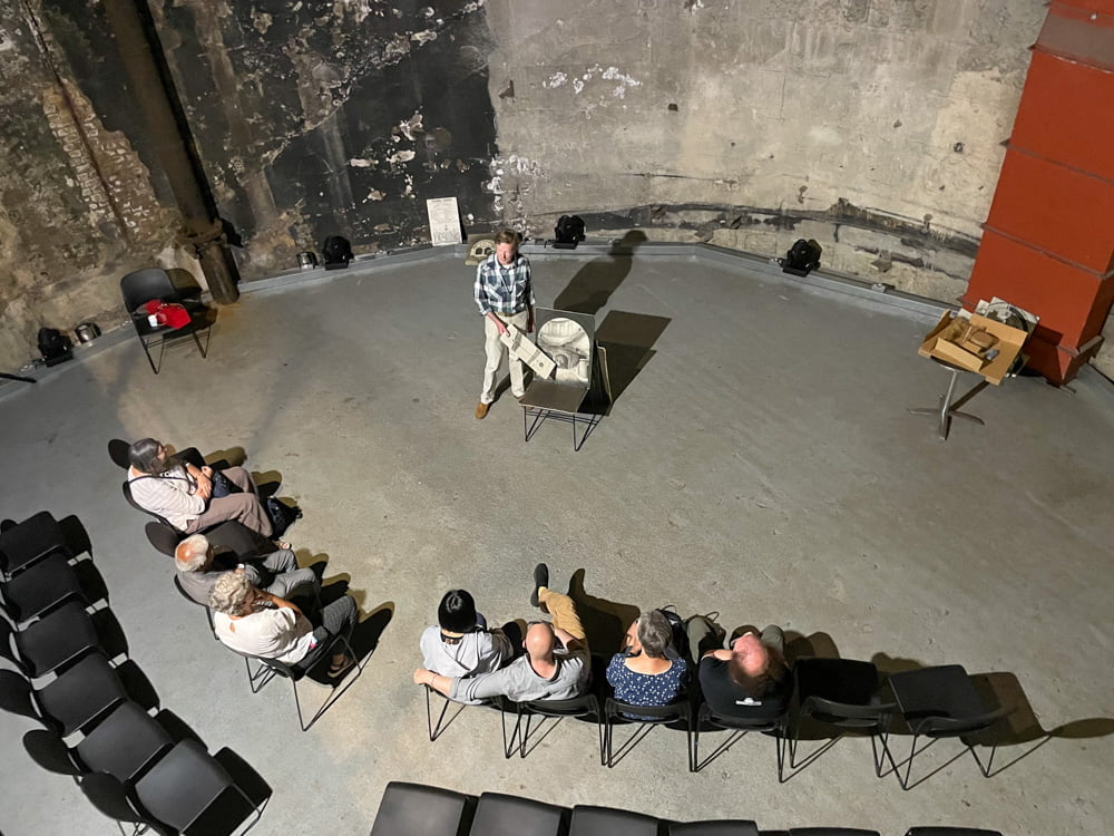 Participants on a guided tour of the Brunel Museum inside the excavation shaft leading to the Thames Tunnel