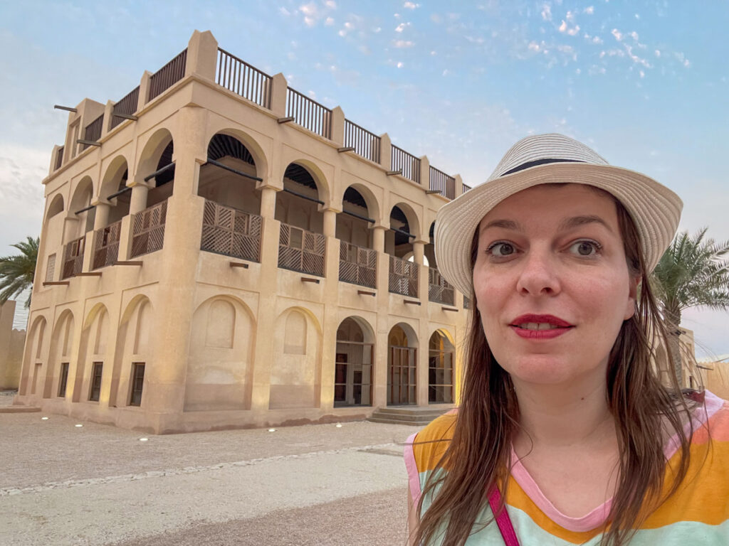 Paola Bertoni in front of Al-Thani Palace in Doha