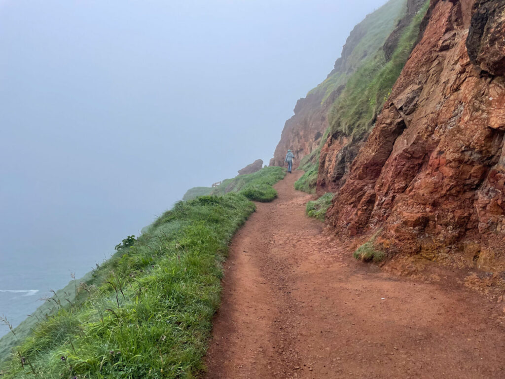 Laterite red rocks along a Giant's Causeway path