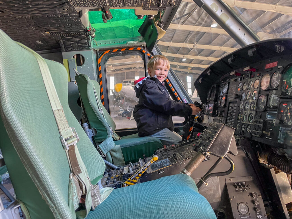 Ben Bertoni inside the cockpit of the Agusta-Bell 212 helicopter at the Malta Aviation Museum