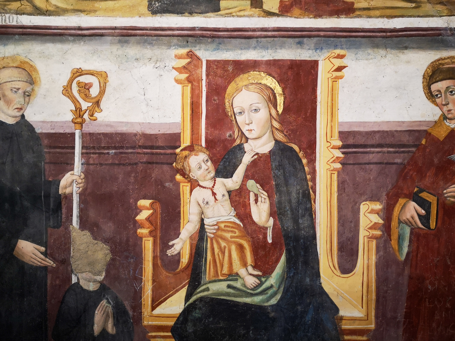Painting Madonna della Pera at the Sacra di San Michele with the patron's face erased