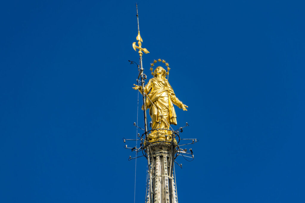 Madonnina statue on the top of Milan Duomo