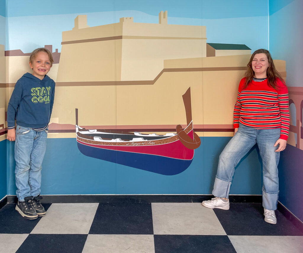 Paola and Ben Bertoni experiencing an optical illusion at Esplora in Malta