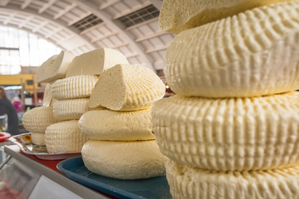 Sulguni Georgian white cheese for sale on the market stall in Tbilisi