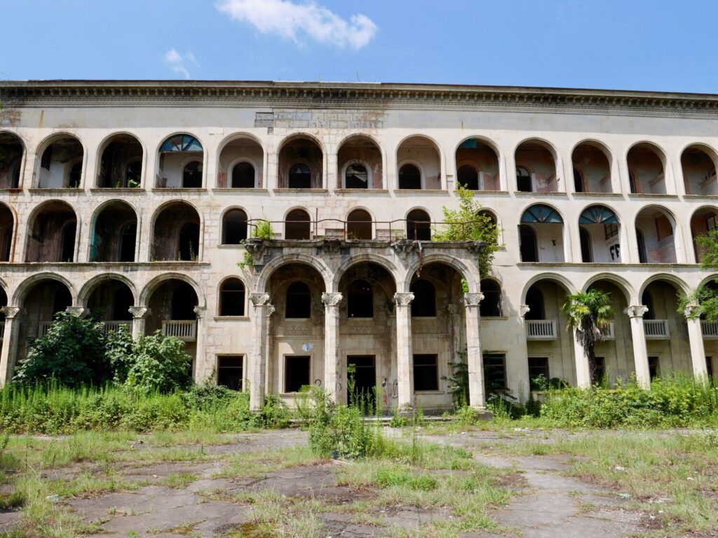 Facade of abandoned Soviet sanatorium Iveria in Tskaltubo, Georgia