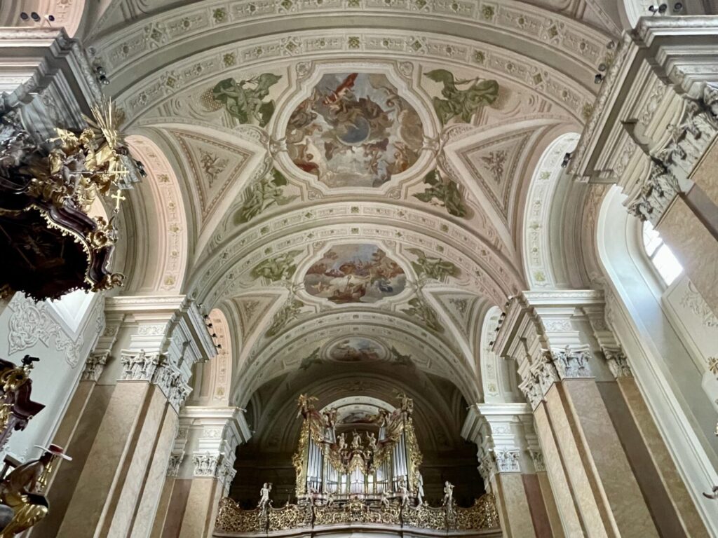 Frescoed ceiling and organ of the Benedictine Abbey church in Tihany, Hungary