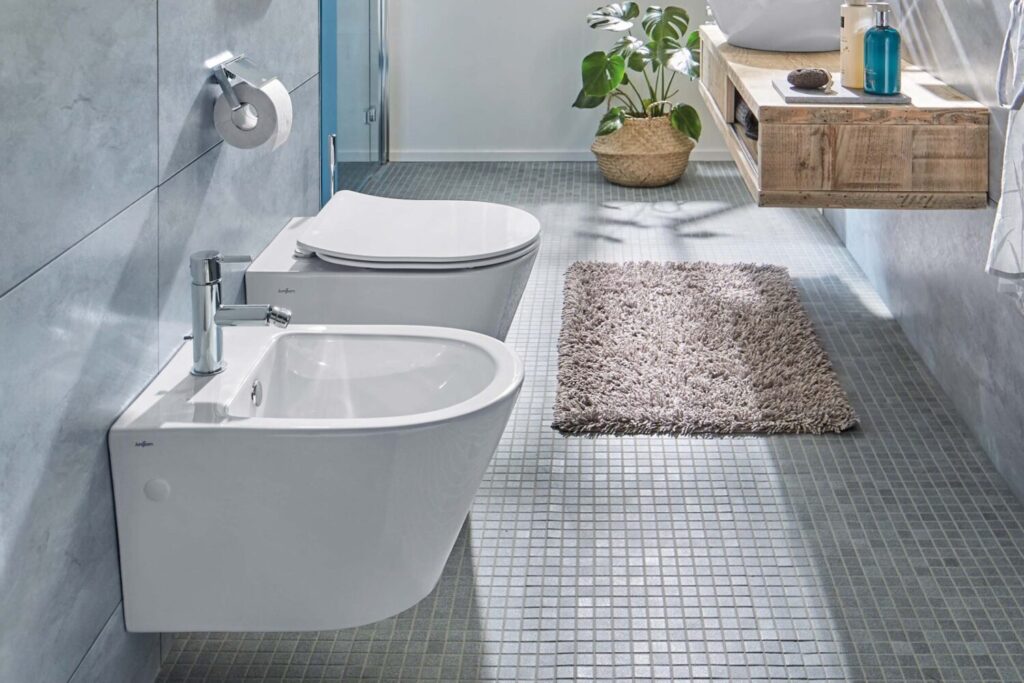 Classic Italian bathroom with toilet and standalone bidet