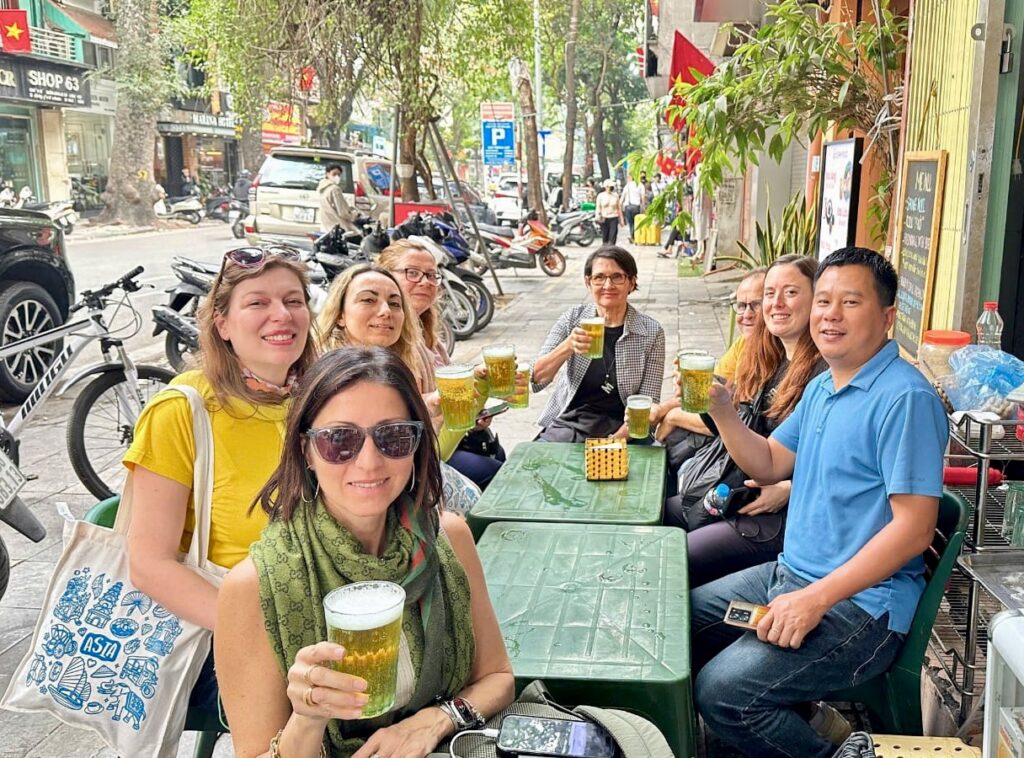 The Travel Blogger Italiane group in a traditional Vietnamese beer spot in Hanoi. From left: Annalisa Spinosa, me, Marina Lo Blundo, Cristina Lamandini, Marina Fiorenti, Marcello Nanetti, Veronica Meriggi, and our guide Nguyen Thanh Lan