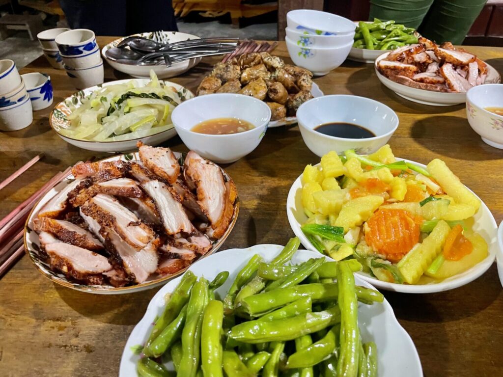 Home-cooked dinner during a homestay in the mountains of Hong Su Phi, Vietnam