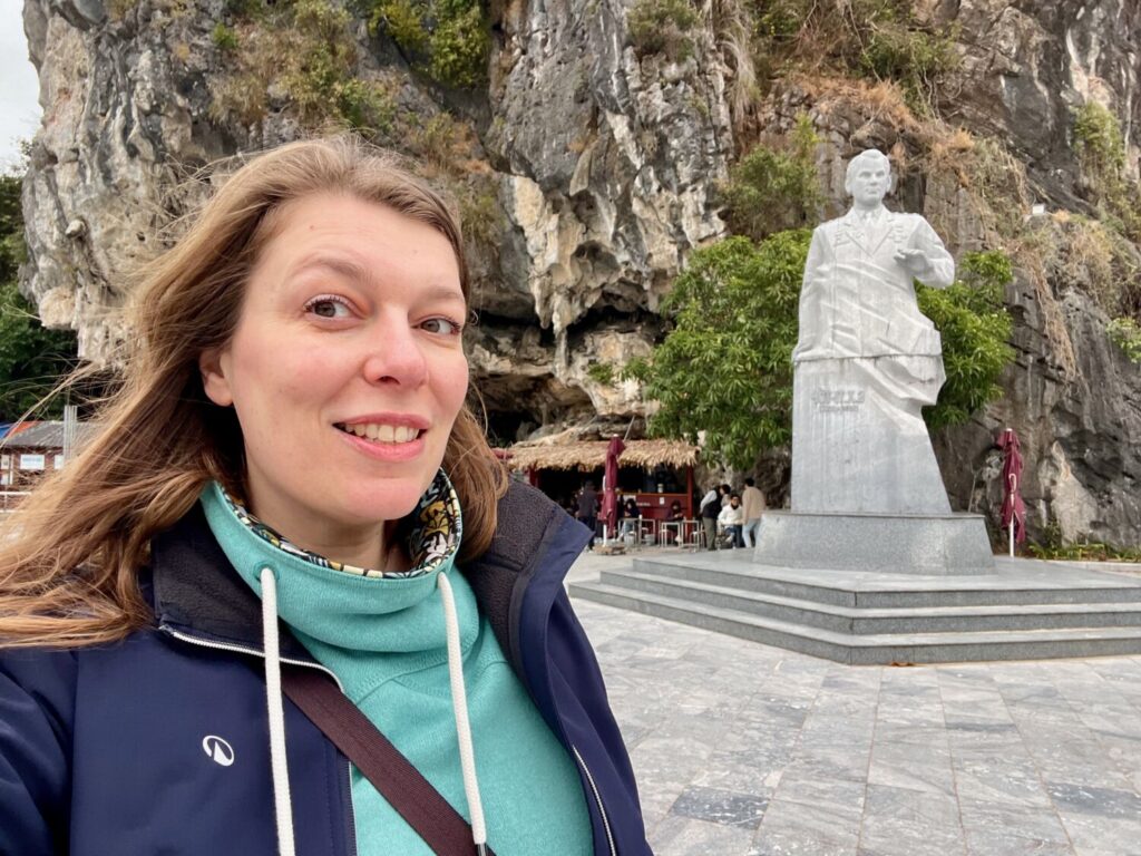 Paola Bertoni with the statue of cosmonaut Titov on Ti Top Island in Ha Long Bay, Vietnam