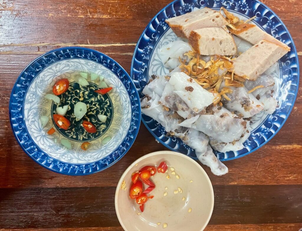 Steam rice cakes (rice-flour crêpes with mushrooms) prepared at Banh Cuon Gia Truyen, Hanoi