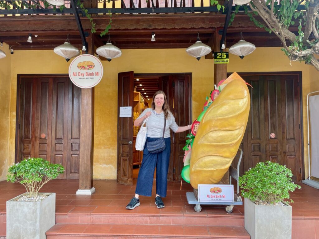 Paola Bertoni in front of a banh mi restaurant in Hoi An, Vietnam