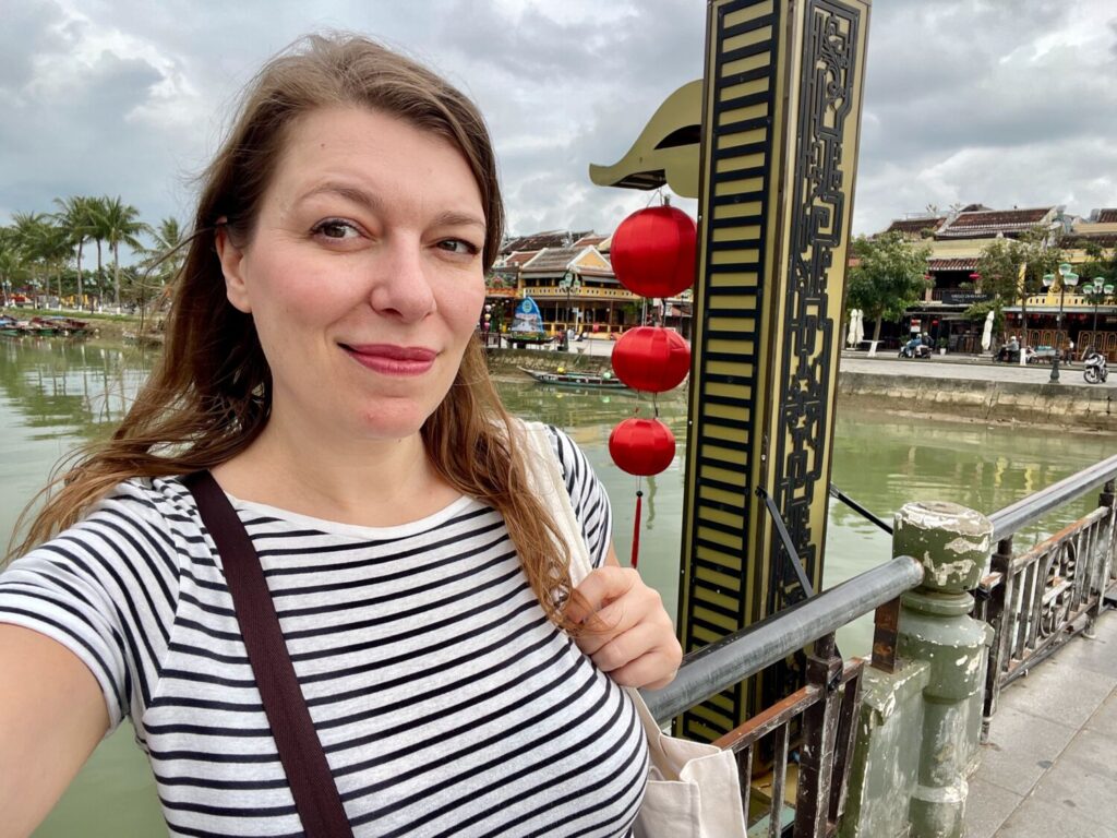 Paola Bertoni on a bridge in Hoi An Old Town, Vietnam