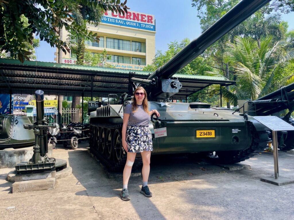 Paola Bertoni next to the tank displayed outside the museum