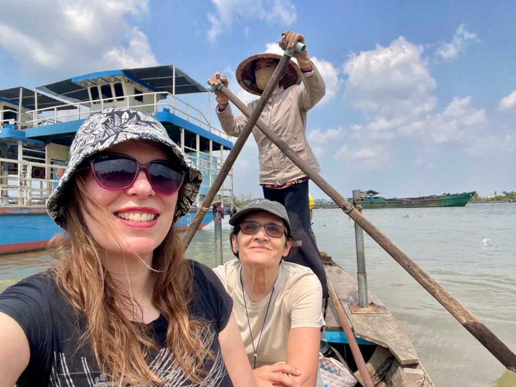 Paola Bertoni and Marina Fiorenti on a boat in the Mekong Delta, Vietnam