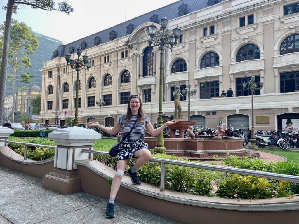 Paola Bertoni in front of the Saigon Opera House, Ho Chi Minh City