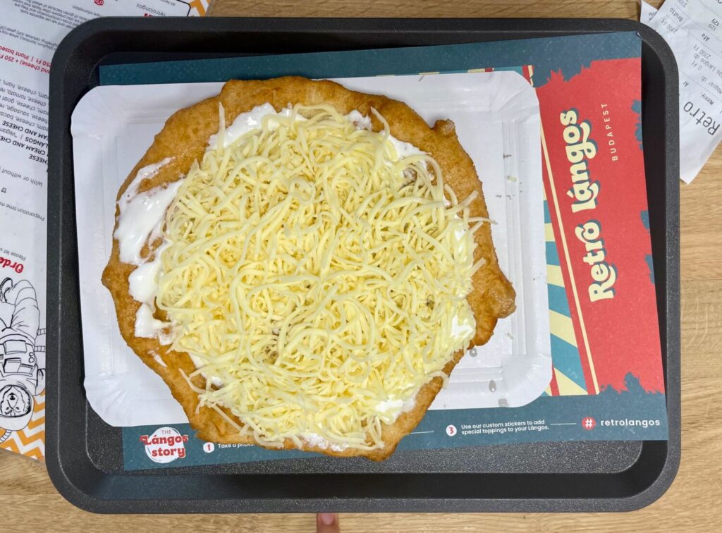 Traditional lángos with sour cream and cheese at Retro Lángos in Budapest