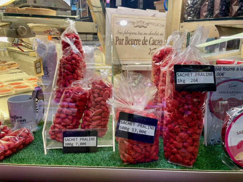 Traditional pink pralines from Lyon on sale at Les Halles de Lyon