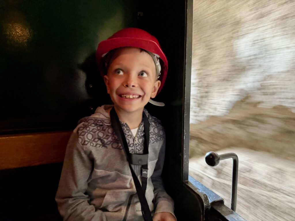 Ben Bertoni inside the old miners' train at Erzberg Mine's Schaubergwerk